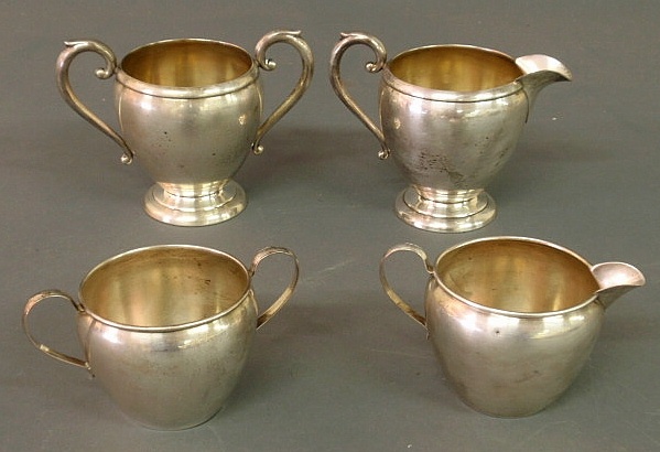 Two pairs of sterling silver creamers