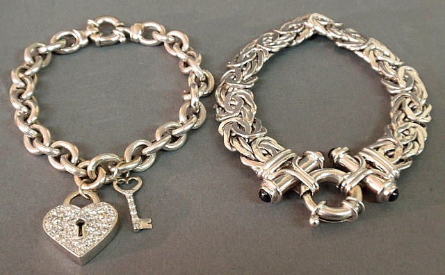 Two ladies 14k white gold bracelets-