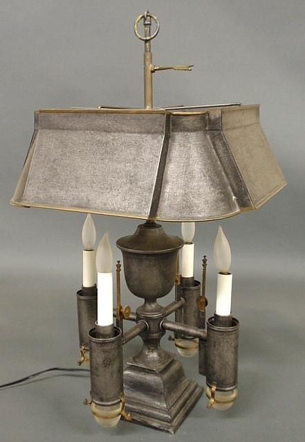 Tin oil lamp converted to electricity.