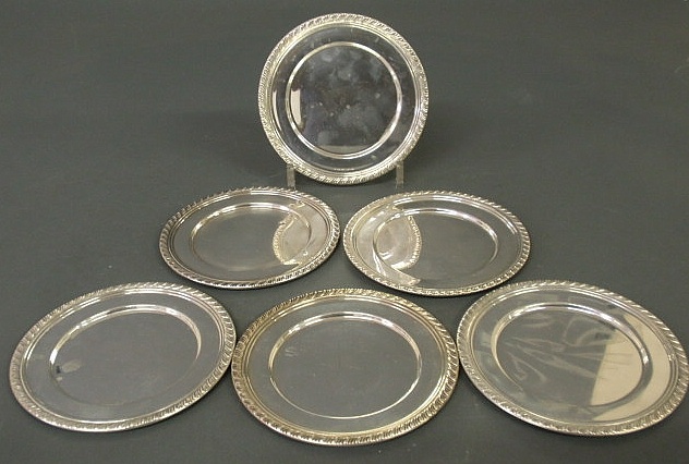 Six sterling silver butter plates. 6dia.