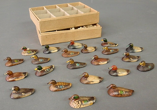 Group of twenty-two hand-painted wood