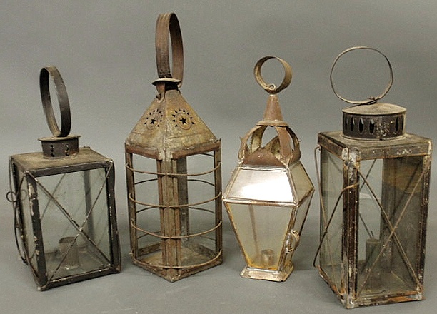 Group of three tin lanterns with 15914e