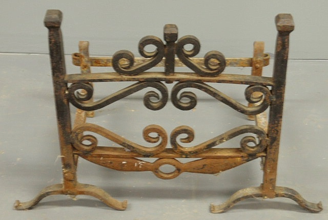 Wrought iron scroll decorated log