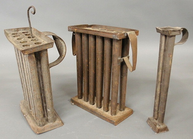 Three tin candle molds- two for