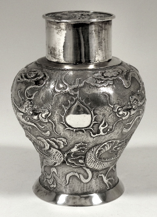 A Chinese silvery metal baluster shaped