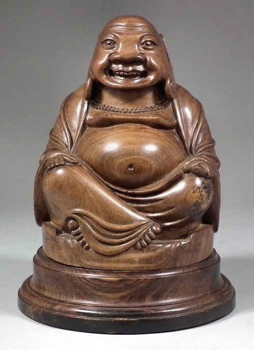 An Eastern carved hardwood figure