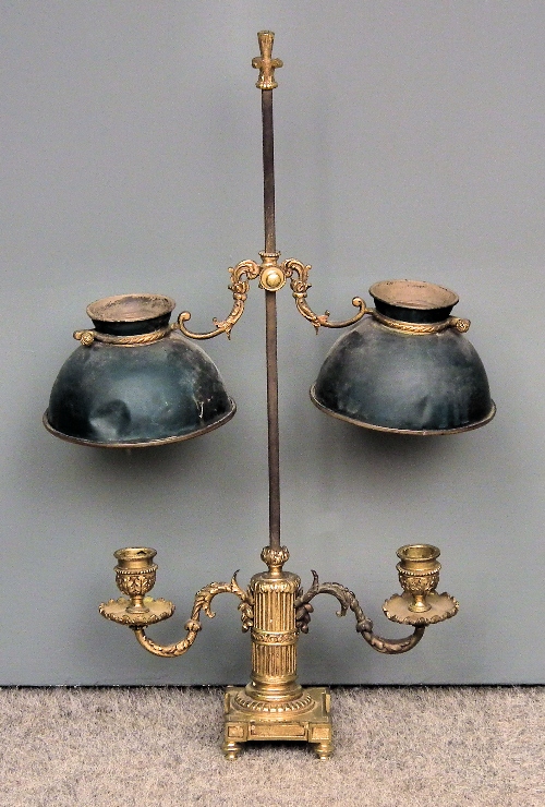 A French gilt brass and japanned