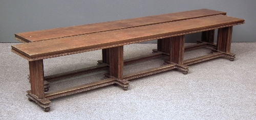 A pair of Victorian oak benches in the