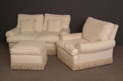 A modern matched lounge suite upholstered 15c1bc