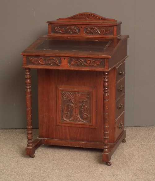 A late Victorian walnut Davenport with