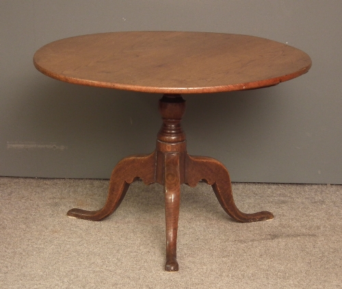 A 19th Century oak circular tripod table