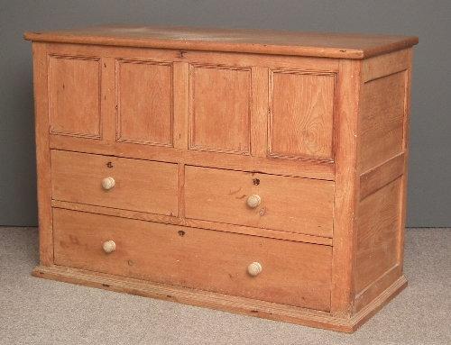 An 18th Century stripped panelled pine