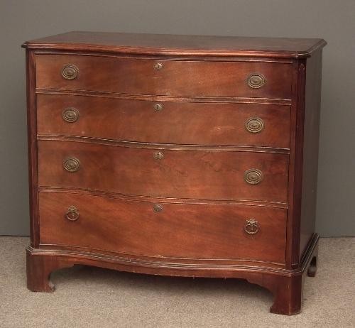 A mahogany serpentine front chest of