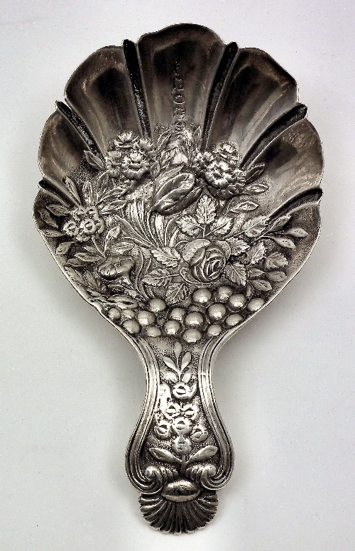 A Victorian silver caddy spoon the scalloped