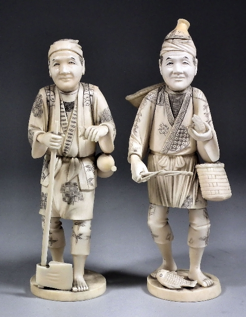 A pair of Japanese carved ivory