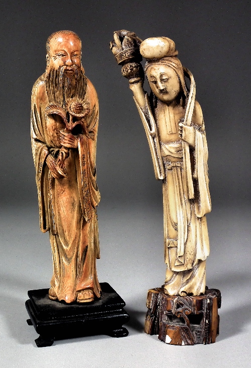 A Chinese carved ivory figure of