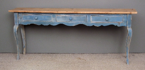 A modern pine side table with plain