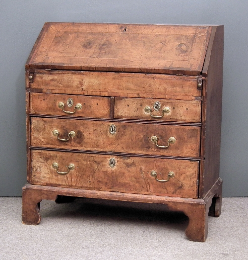 An 18th Century walnut bureau the whole