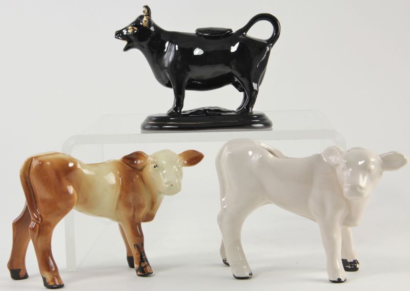Three Cow Figuresincluding two planters