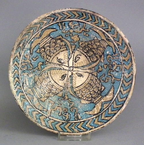 An early Islamic pottery bowl painted 15cd4b