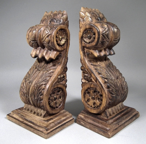 A pair of modern hardwood corbels