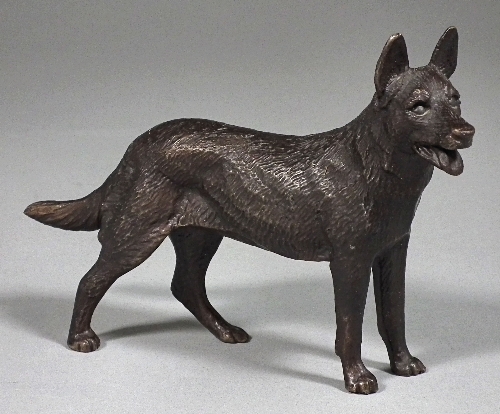 A brown patinated bronze figure