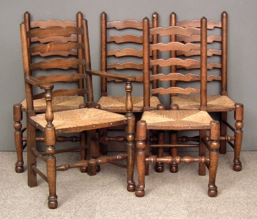 A set of five oak ladder back dining