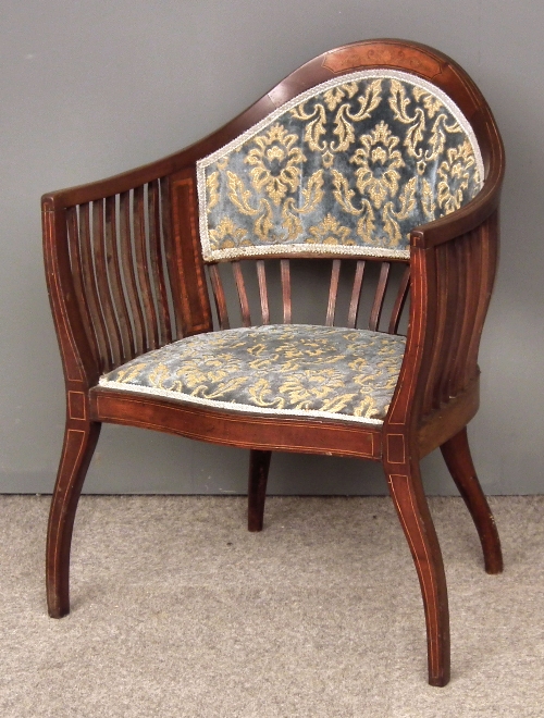 An Edwardian mahogany tub shaped