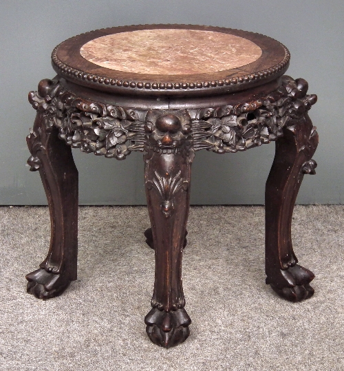 A Chinese rosewood circular jardiniere