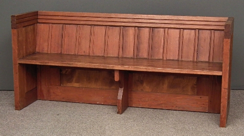 A panelled pitch pine pew 68ins