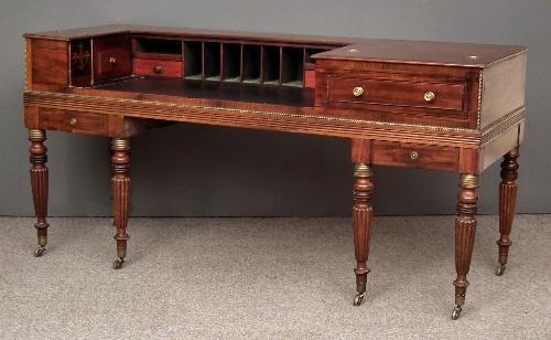 A George IV mahogany desk inset to top