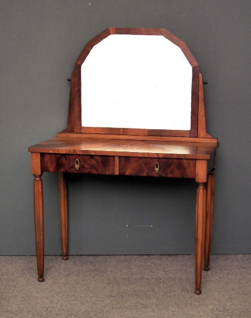 A mahogany dressing table in the