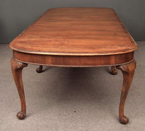 A 1920s walnut board room table of Queen