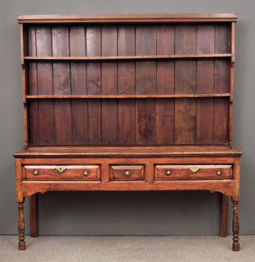 An 18th Century pine and fruitwood