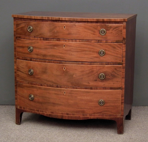 A late Georgian mahogany bow-front chest