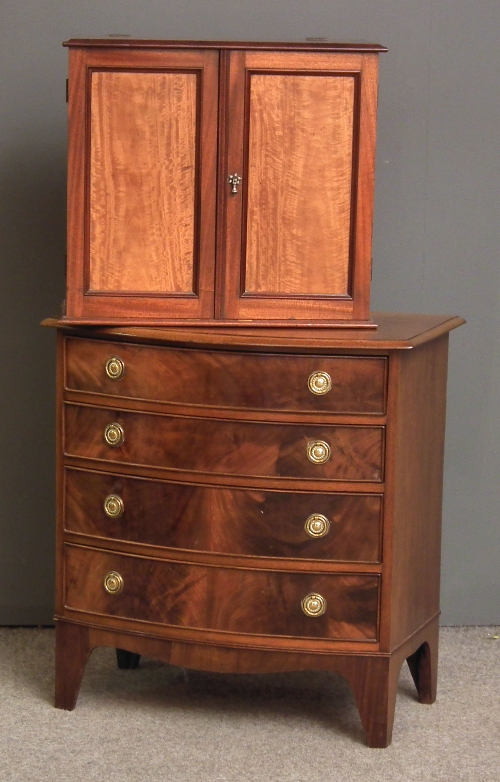 A mahogany bow-front chest of drawers