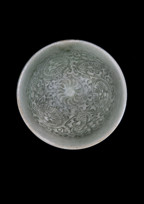 A Chinese green glazed press moulded