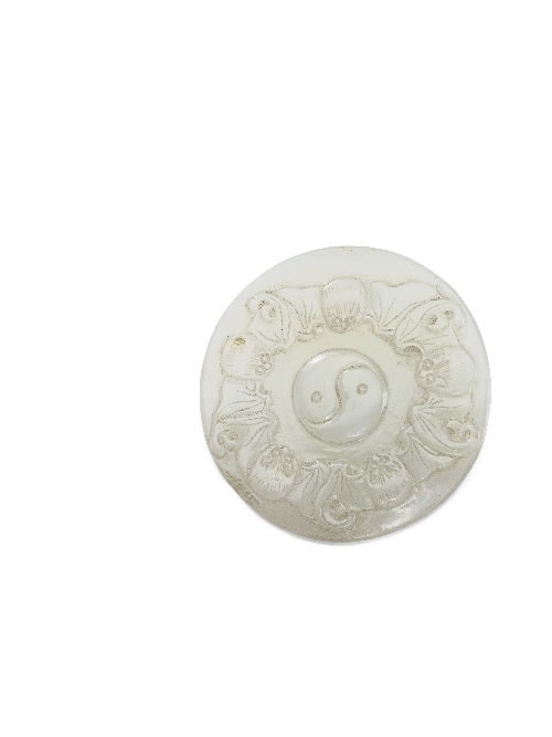 A Chinese white jade plaque carved with