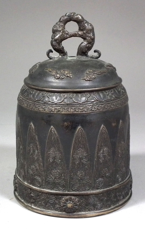 An old oriental brown patinated