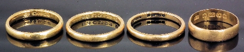 Four 22ct gold wedding bands (weight