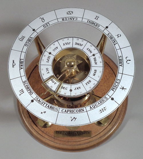 The Calendar Clock - A modern brass