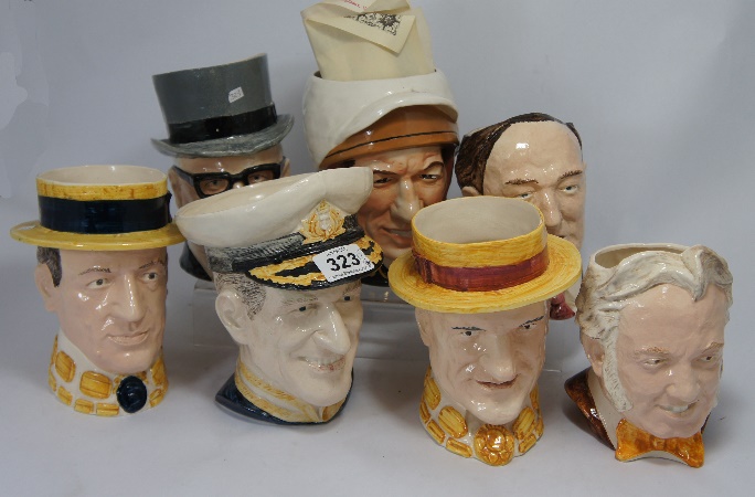 A collection of Large Character Jugs