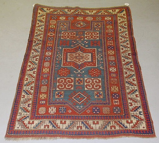 Antique Kazak oriental throw mat