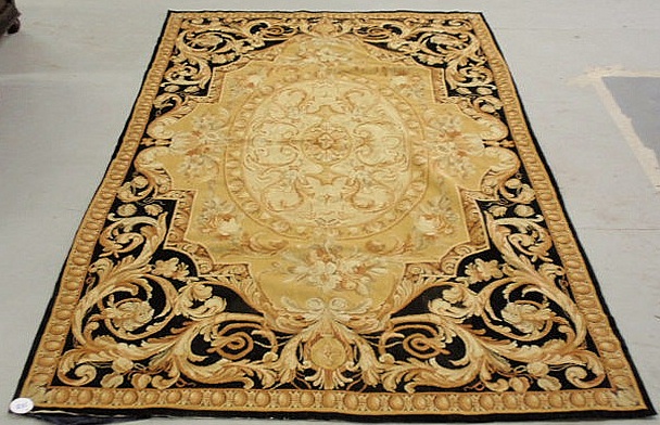 Large needlepoint carpet in a French