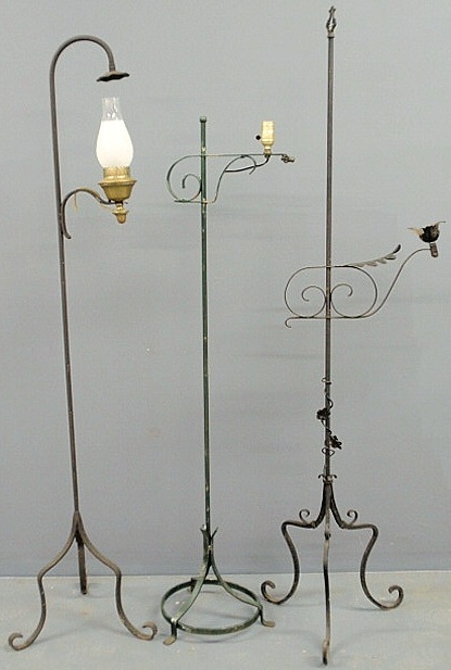 Three wrought iron standing floor