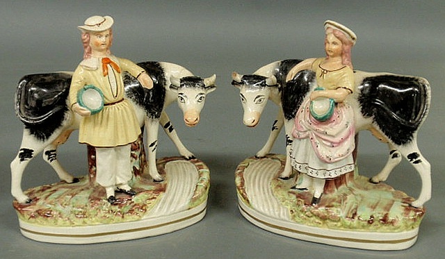 Pair of 19th c. Staffordshire cows with