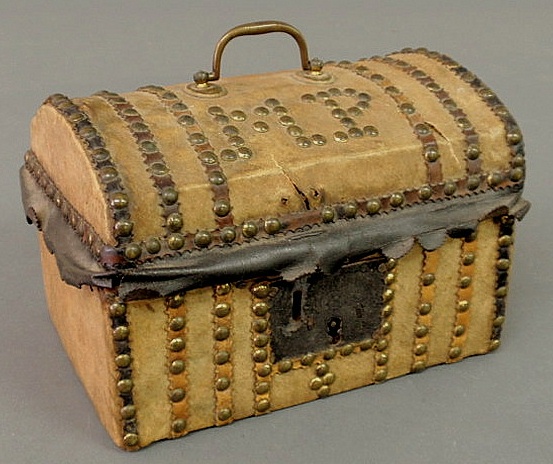 Early buckskin storage box with initials