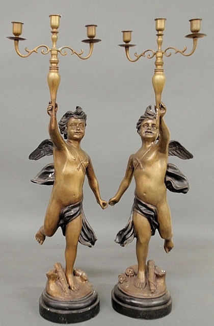 Pair of faux bronze metal candelabra