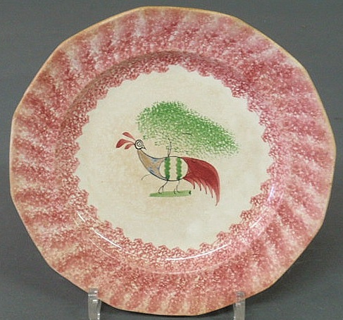 Unusual peafowl red spatterware plate