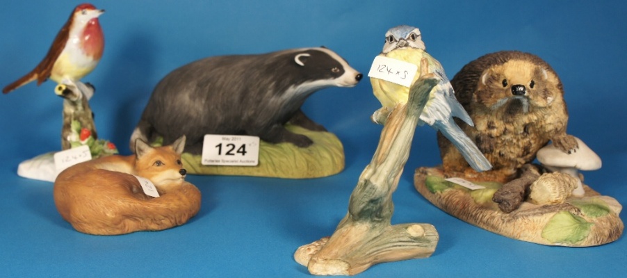 A collection of animal sculptures including